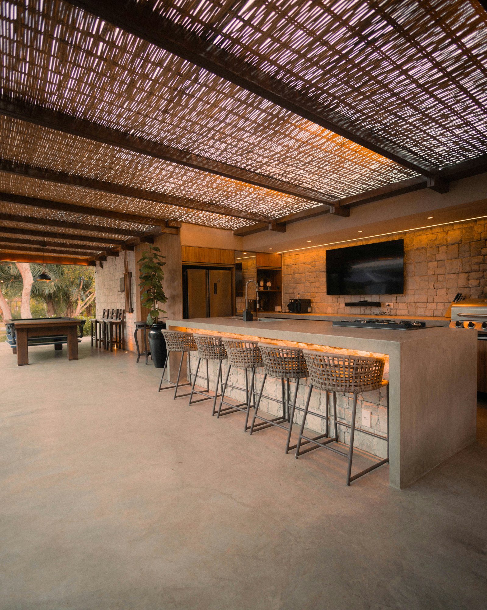 Luxury outdoor kitchen and entertaining area at a Miami estate